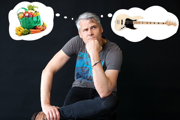 Gio between two speech bubbles containing groceries and a bass