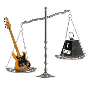 Image of a scale weighing bass on one side and a 1 ton weight on the other side