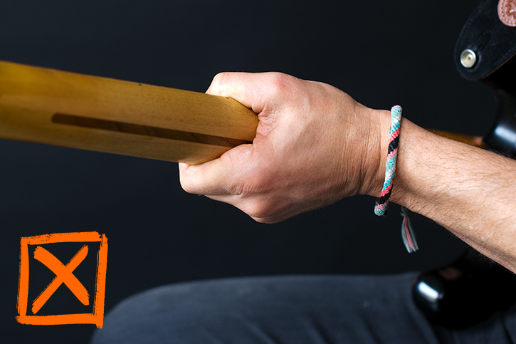Image depicting the death grip on a bass neck