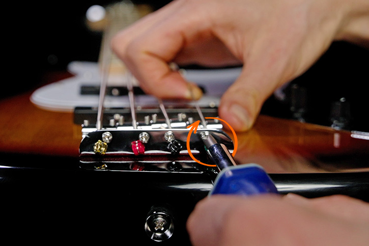 Picture showing how to tighten the screw on the saddles