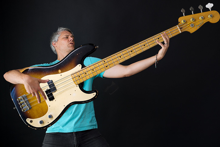 Gio struggling to hold an oversized bass