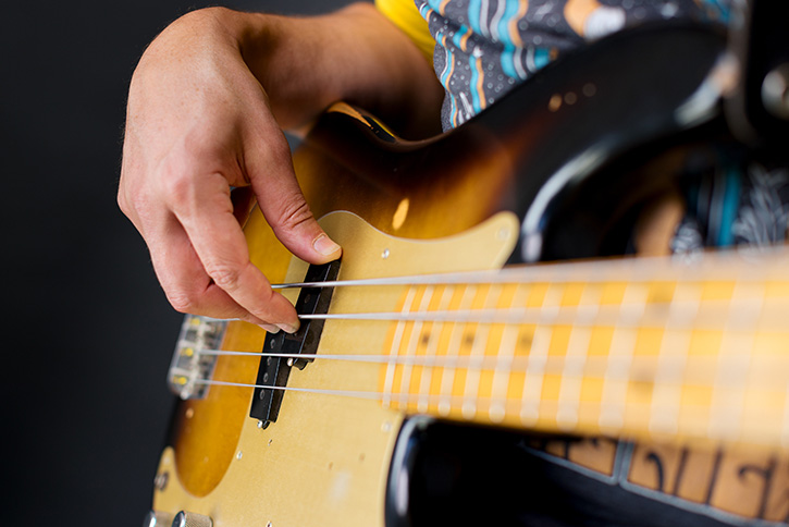 Picture showcasing how to anchor a thumb on the bass